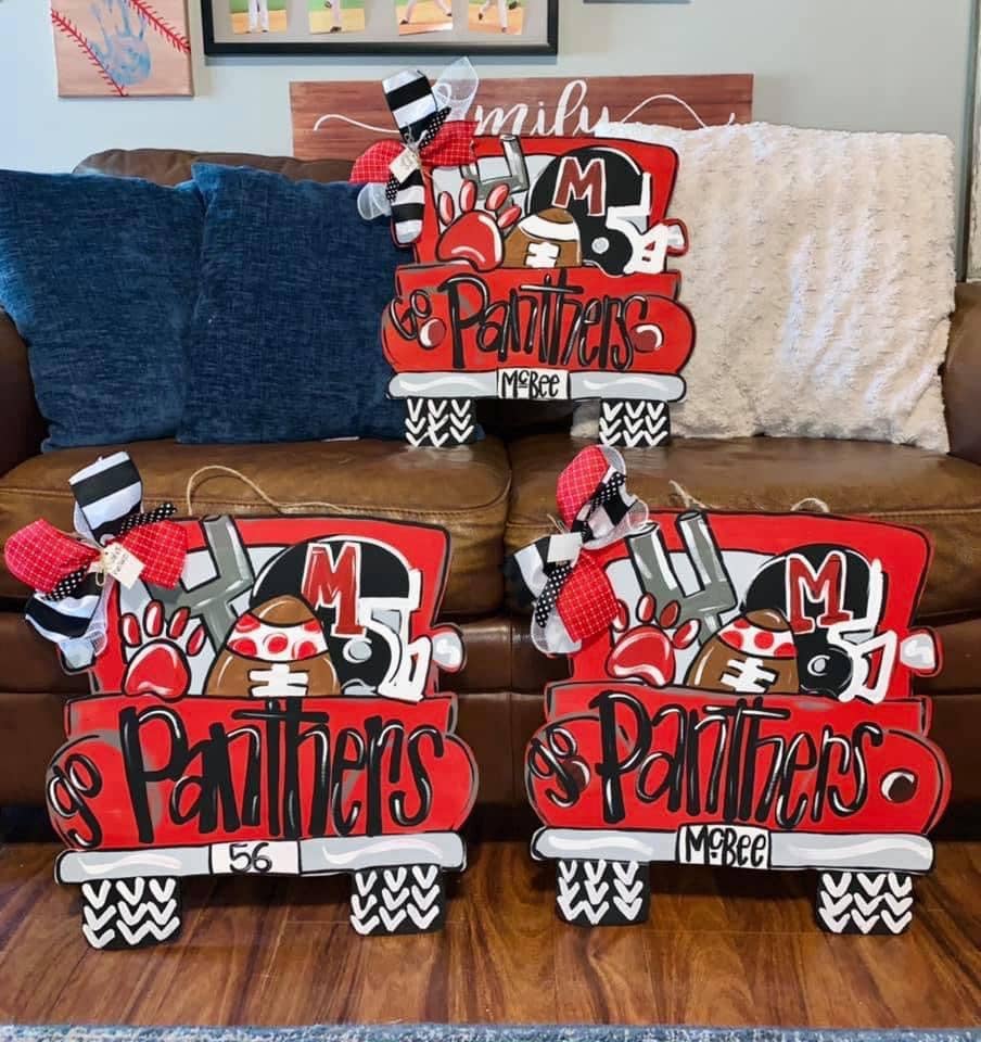 Football team truck door hanger